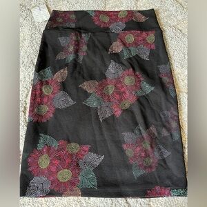 NWT Lularoe Cassie pencil skirt size large. Black background and floral print